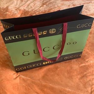 Paper Gucci Shopper
1 for $35

This is a shopping bag from the store
